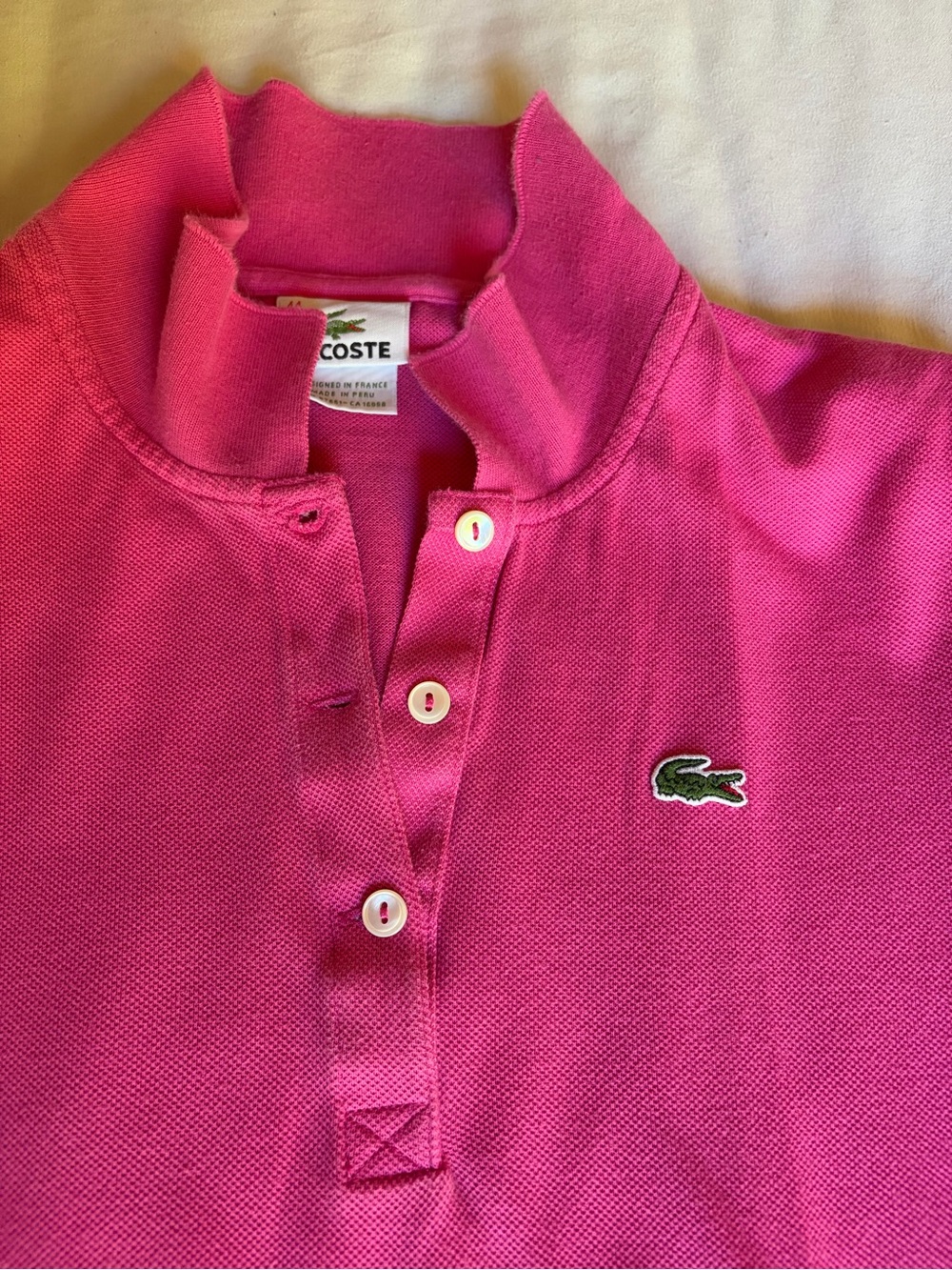 Lacoste Women’s Pink Polo Shirt with Crocodile Logo (size 44/medium)